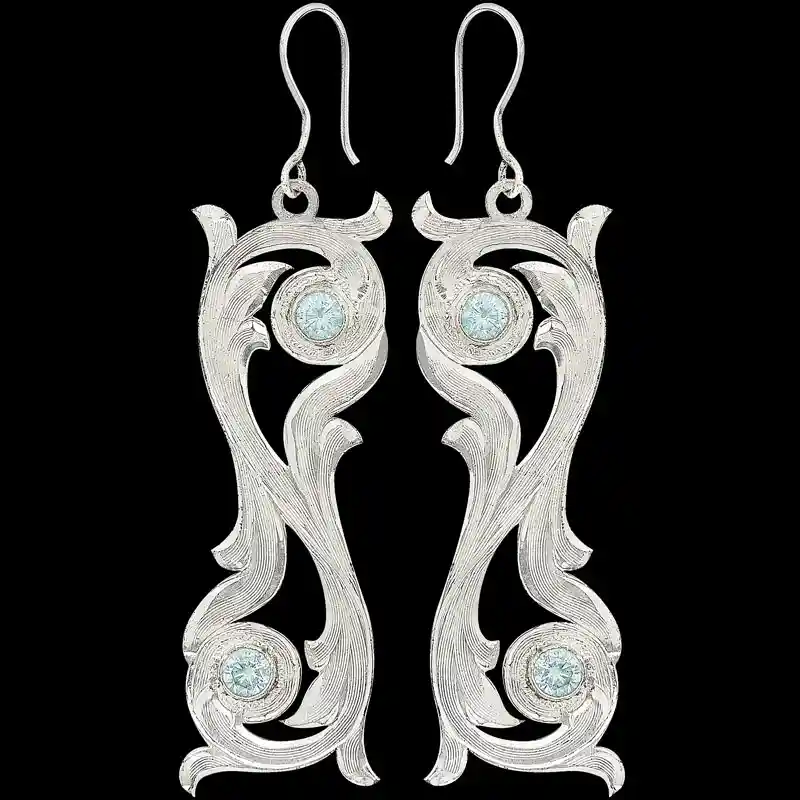 A pair of silver western earrings for women scroll shaped featuring zirconia stones 