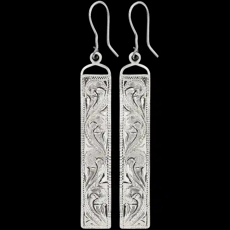A pair of silver western earrings for women, rectangular shaped and hand engraved