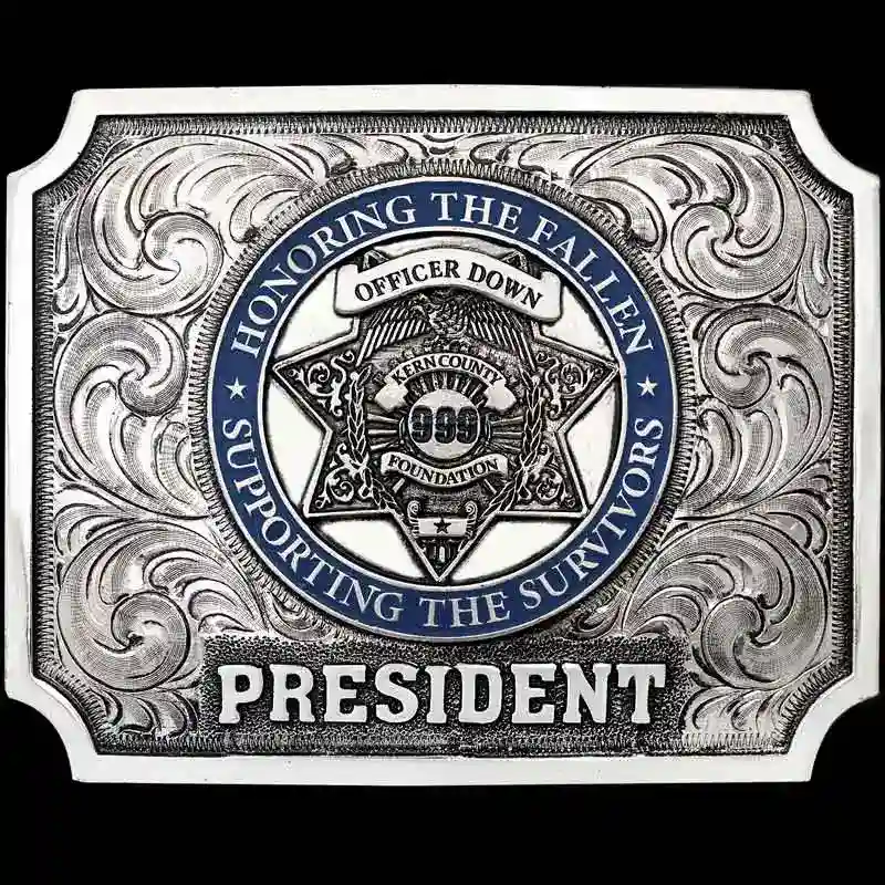 Bakersfield custom western belt buckle handcrafted in German silver with engraved details by Molly's Custom Silver.