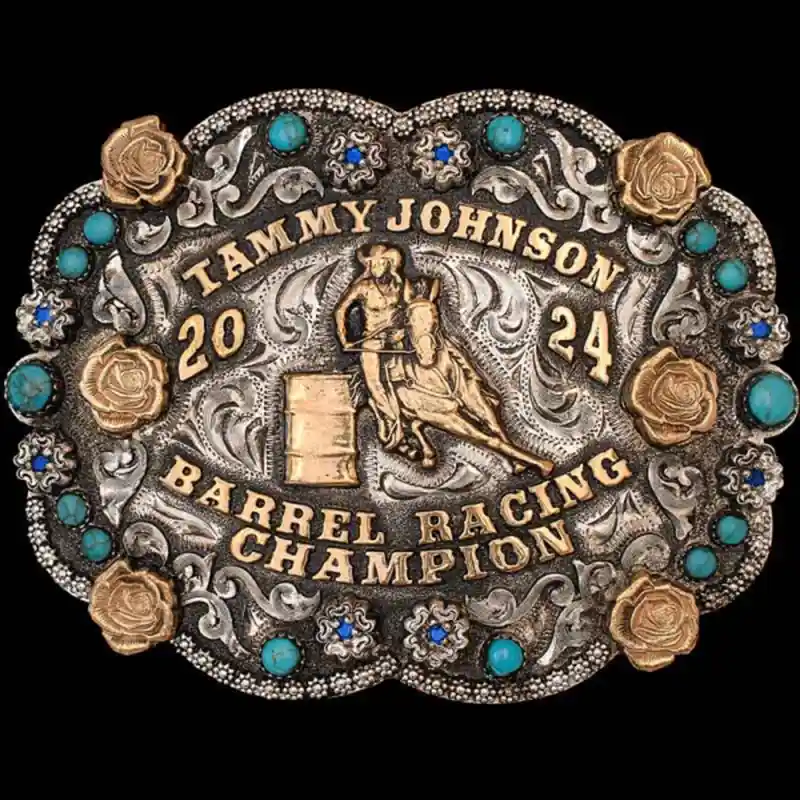 A custom women's rodeo belt buckle featuring a barrel racing cowgirl figure and personalized name, with turquoise stones
