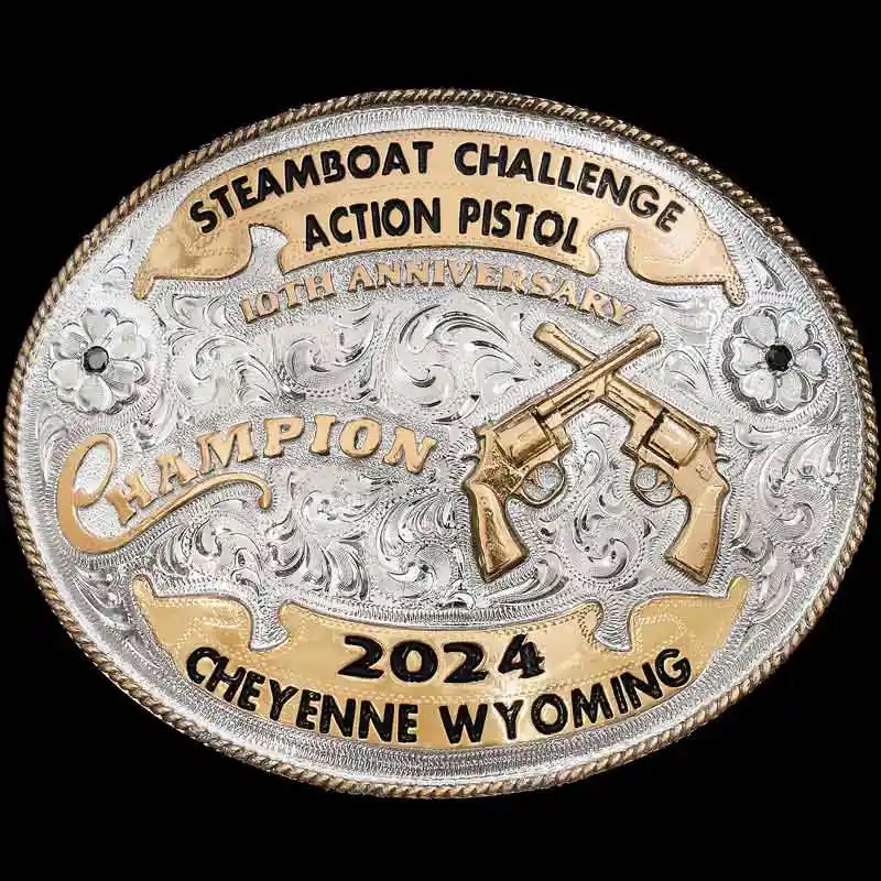 A custom oval shooting belt buckle trophy for Steamboat Challenge Action Pistol Champion featuring crossed guns golden bronze figure 
