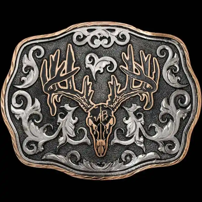 A custom hunting betl buckle for men featuring a deer skull with a ranch brand 