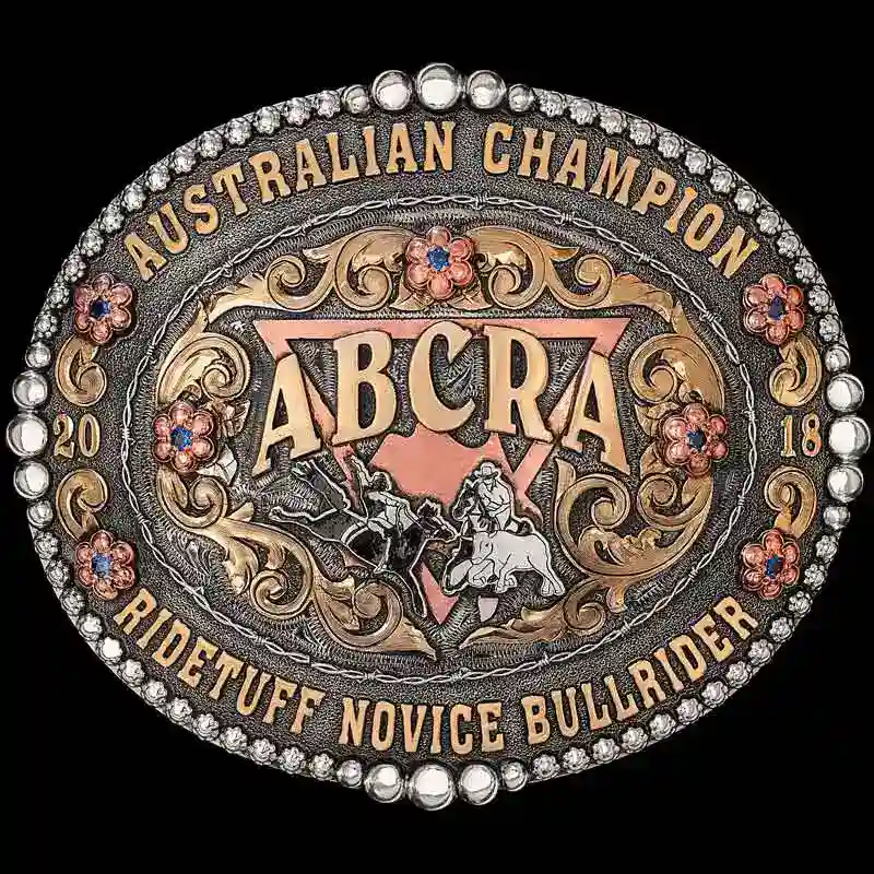 A custom oval bull riding belt buckle trophy for Australian Ridetuff Novice Bull Rider Champion featuring a bronc rider and steer wrestler figure 
