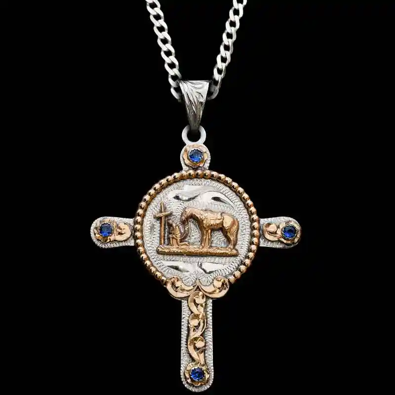 A custom silver cross pendant necklace for men and women, western-inspired design. featuring praying cowboy figure 