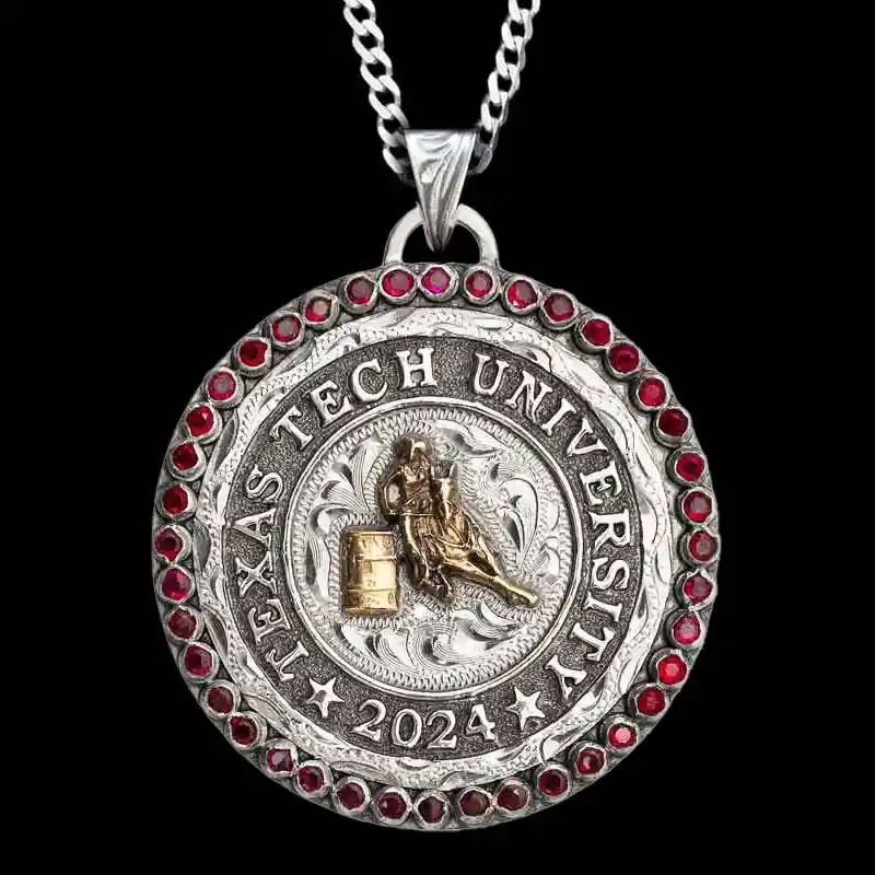 A custom pendant necklace for graduations featuring a barrel racing figure and custom silver lettering, with a sterling silver chain 
