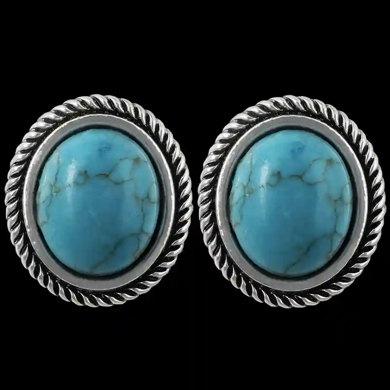 Elevate any outfit with our Sweat Pea Earrings, crafted from German Silver, featuring a bold turquoise center and detailed with solid and rope-edge accents.
