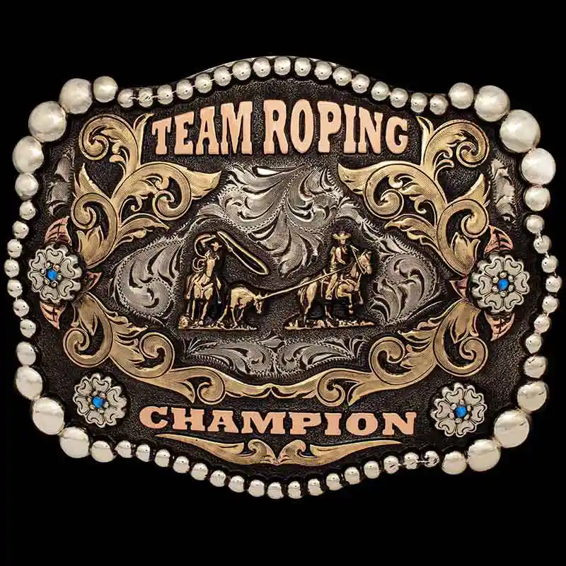 A custom team roping belt buckle featuring a team roper figure 