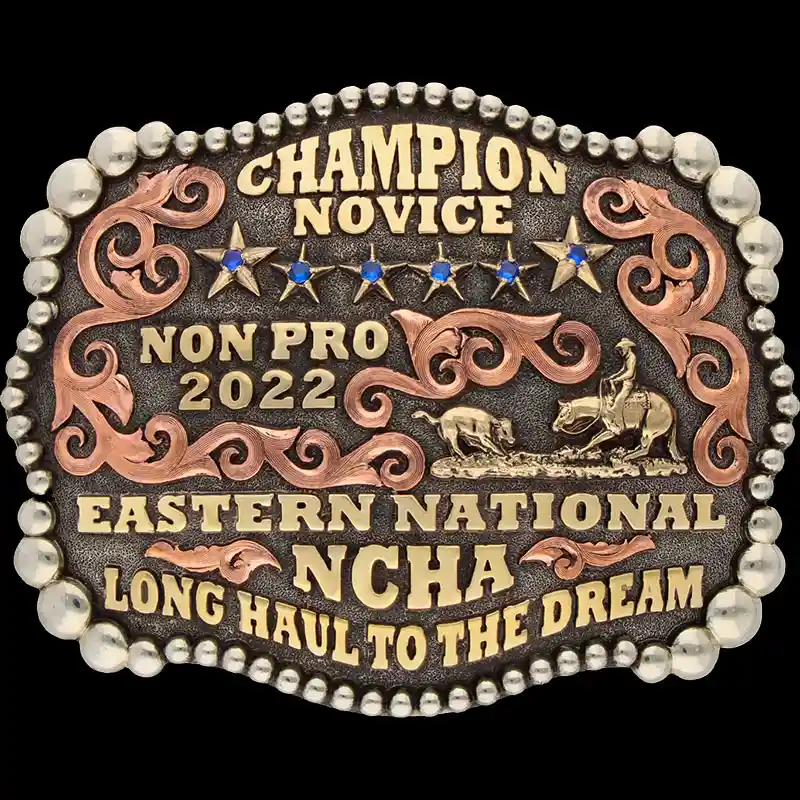 A custom trophy belt buckle for Eastern National NCHA Novice Champion featuring a cutting figure and golden stars 