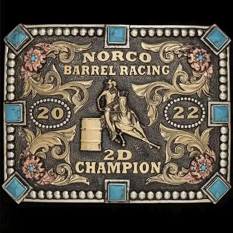 A custom rodeo belt buckle trophy for women for Norco Barrel Racing Champion featuring a cowgirl figure
