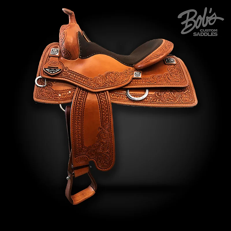Tim McQuay custom western reining saddle handcrafted for competitive riding performance.